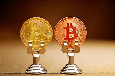 Gold and digital assets representing the tension between traditional treasury investments and Bitcoin