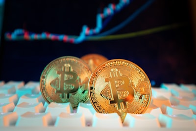 Bitcoin and financial charts showing crypto market analysis