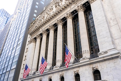 NYSE stock exchange building symbolizing Wall Street institutional investment shift toward crypto