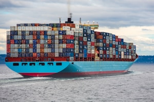 Shipping containers at port logistic costs 2026